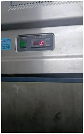 Digital temperature controller on a commercial refrigerator