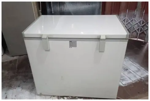 White commercial chest freezer serviced by the team